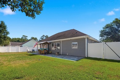 Welcome to this charming 3-bedroom, 2-bath home offering an - photo 24