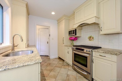 Welcome to this one-of-a-kind gem in the prestigious Village of - photo 11