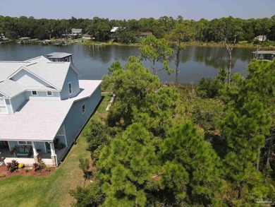 Waterfront lot in the Russell Bayou subdivision on Innerarity - photo 1