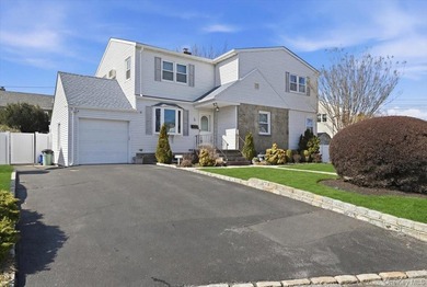 Welcome to this beautifully maintained 4-bedroom, 2 full bath - photo 1
