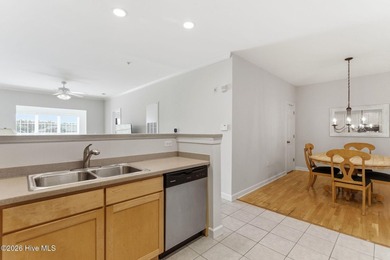 Perched on the top floor as a desirable corner end unit, this 3 - photo 13