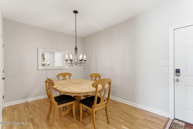 Perched on the top floor as a desirable corner end unit, this 3 - photo 14