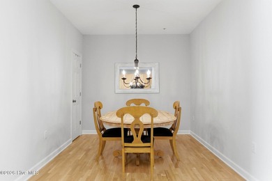 Perched on the top floor as a desirable corner end unit, this 3 - photo 15