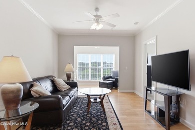 Perched on the top floor as a desirable corner end unit, this 3 - photo 17