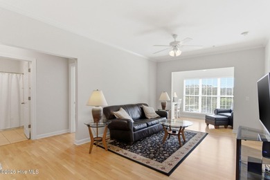 Perched on the top floor as a desirable corner end unit, this 3 - photo 18