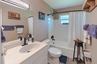 Beautifully updated 2BD/2BA corner residence featuring impact - photo 10