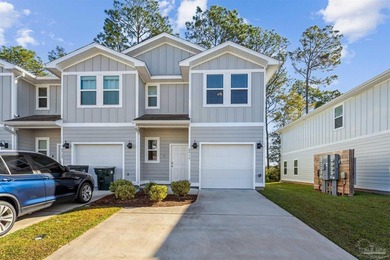 As one of the few end-unit townhomes in Admiral's Quarter, this - photo 1