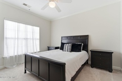 Perched on the top floor as a desirable corner end unit, this 3 - photo 22