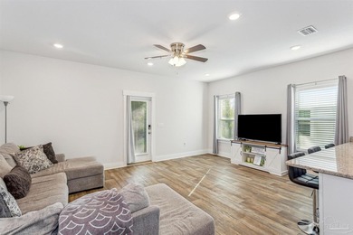 As one of the few end-unit townhomes in Admiral's Quarter, this - photo 2