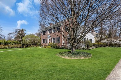 Welcome to this beautifully maintained brick Center Hall - photo 3