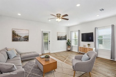 As one of the few end-unit townhomes in Admiral's Quarter, this - photo 3