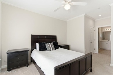Perched on the top floor as a desirable corner end unit, this 3 - photo 24