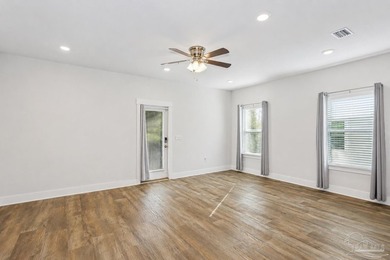 As one of the few end-unit townhomes in Admiral's Quarter, this - photo 4