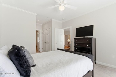 Perched on the top floor as a desirable corner end unit, this 3 - photo 25