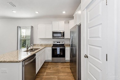 As one of the few end-unit townhomes in Admiral's Quarter, this - photo 7