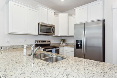 As one of the few end-unit townhomes in Admiral's Quarter, this - photo 8