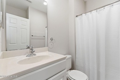 Perched on the top floor as a desirable corner end unit, this 3 - photo 32
