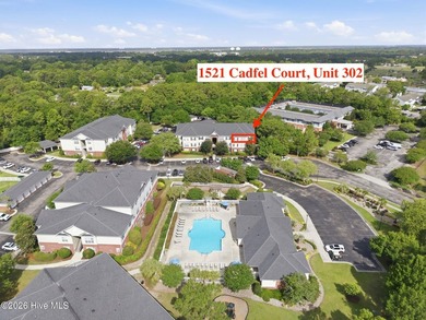 Perched on the top floor as a desirable corner end unit, this 3 - photo 35
