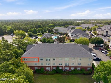 Perched on the top floor as a desirable corner end unit, this 3 - photo 36