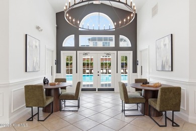Perched on the top floor as a desirable corner end unit, this 3 - photo 39