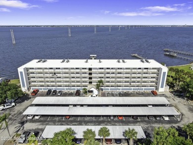 Welcome to this beautifully updated first-floor riverfront condo - photo 1