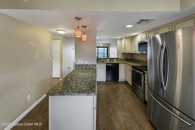 Welcome to this beautifully updated first-floor riverfront condo - photo 3