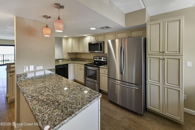 Welcome to this beautifully updated first-floor riverfront condo - photo 4
