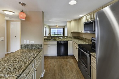 Welcome to this beautifully updated first-floor riverfront condo - photo 5