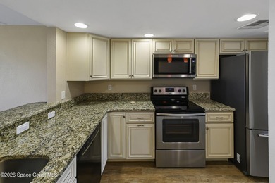 Welcome to this beautifully updated first-floor riverfront condo - photo 6