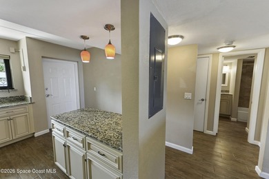 Welcome to this beautifully updated first-floor riverfront condo - photo 9