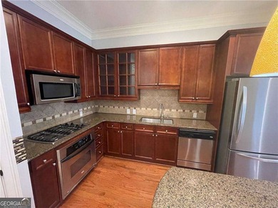 Take a look at this charming 1-bedroom, 1.5-bath condo in the