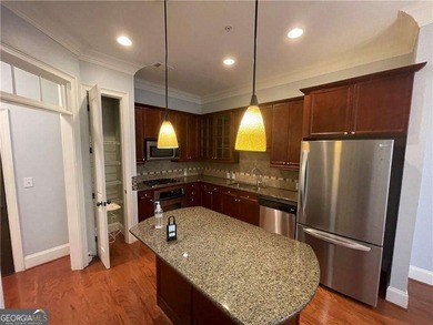 Take a look at this charming 1-bedroom, 1.5-bath condo in the