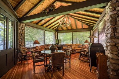 'Tojenka' is a rare Big Moose Lake estate offering an - photo 32