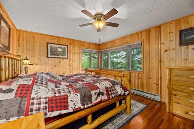 Discover your dream home on the coveted Spider Lake Chain! This - photo 12