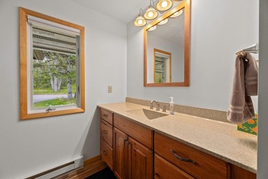 Discover your dream home on the coveted Spider Lake Chain! This - photo 13
