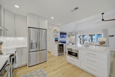 Beautifully remodeled coastal home featuring a private dock - photo 14