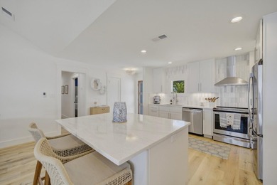 Beautifully remodeled coastal home featuring a private dock - photo 16
