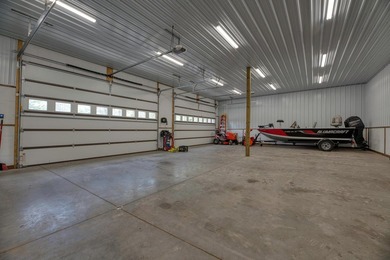 Discover your dream home on the coveted Spider Lake Chain! This - photo 17