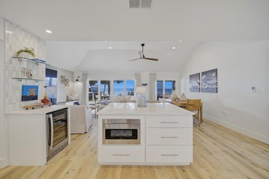 Beautifully remodeled coastal home featuring a private dock - photo 18