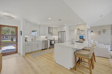 Beautifully remodeled coastal home featuring a private dock - photo 19