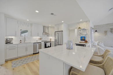 Beautifully remodeled coastal home featuring a private dock - photo 20