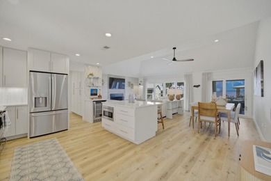 Beautifully remodeled coastal home featuring a private dock - photo 22