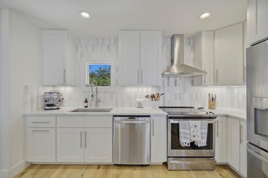 Beautifully remodeled coastal home featuring a private dock - photo 23