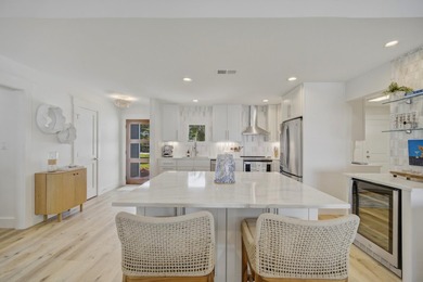 Beautifully remodeled coastal home featuring a private dock - photo 26