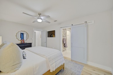 Beautifully remodeled coastal home featuring a private dock - photo 29