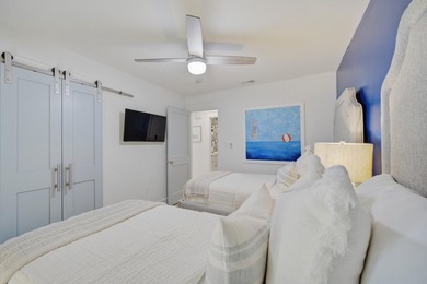 Beautifully remodeled coastal home featuring a private dock - photo 37