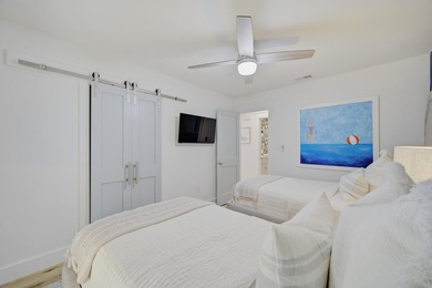 Beautifully remodeled coastal home featuring a private dock - photo 38