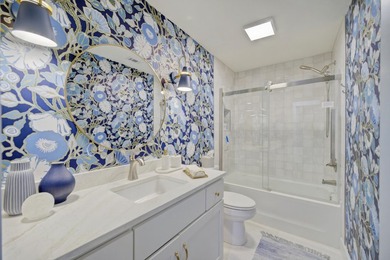 Beautifully remodeled coastal home featuring a private dock - photo 39