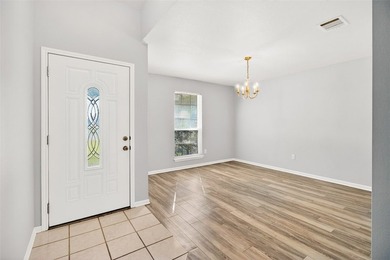 WELL CARED FOR all brick home on large tree shaded lot with new - photo 3