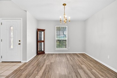 WELL CARED FOR all brick home on large tree shaded lot with new - photo 4